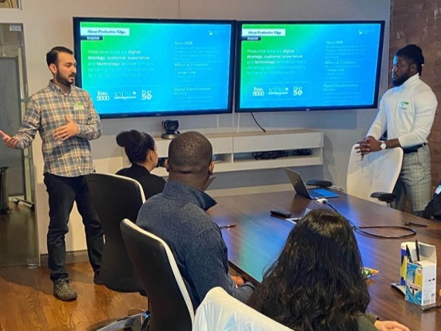 PE team members present at an event with the UIC Black Tech Scholars.