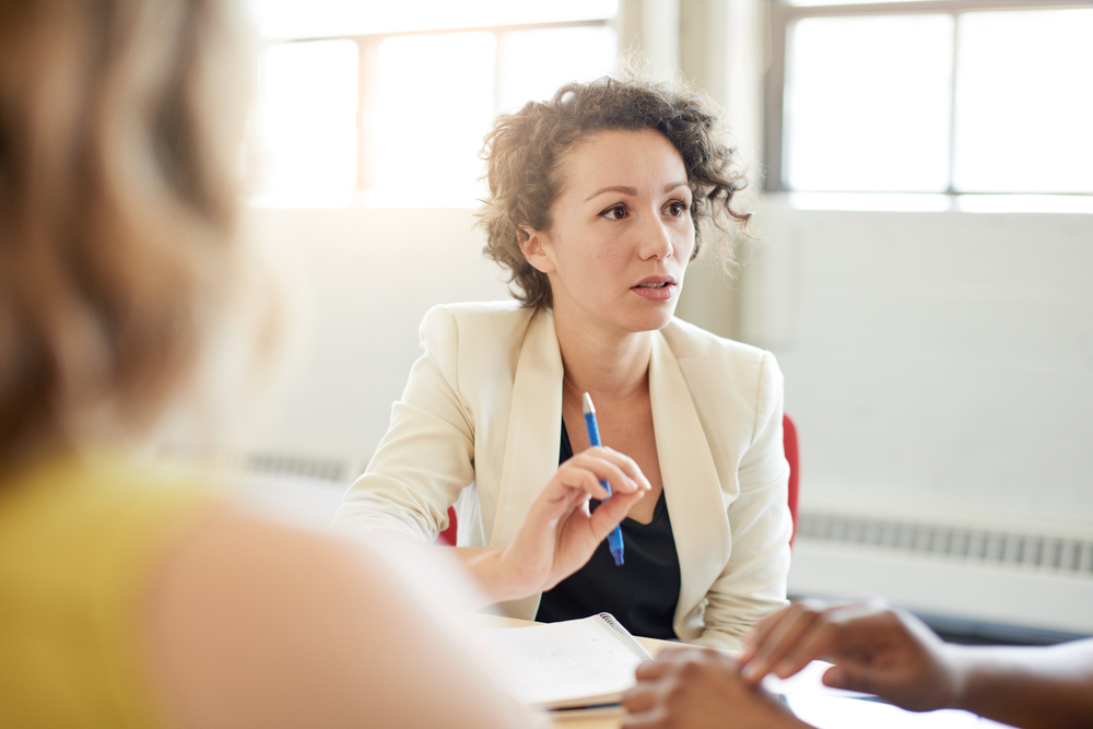 woman speaking during a meeting