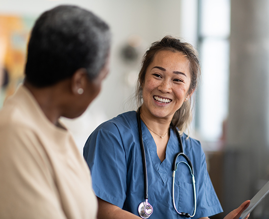 doctor speaking to a patient